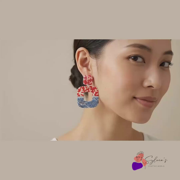 Boucles d’oreilles Nami en polymère avec design japonais et effet vagues